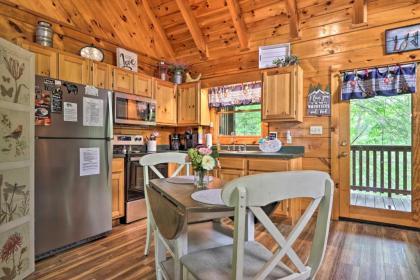 Romantic Gatlinburg Studio Cabin with Hot Tub and Deck - image 11