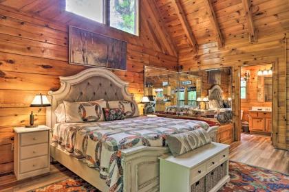 Romantic Gatlinburg Studio Cabin with Hot Tub and Deck - image 13