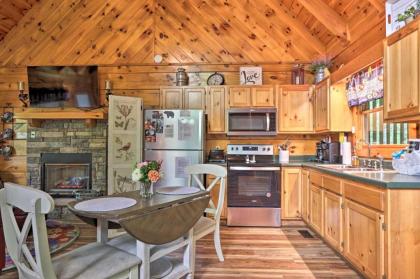 Romantic Gatlinburg Studio Cabin with Hot Tub and Deck - image 14