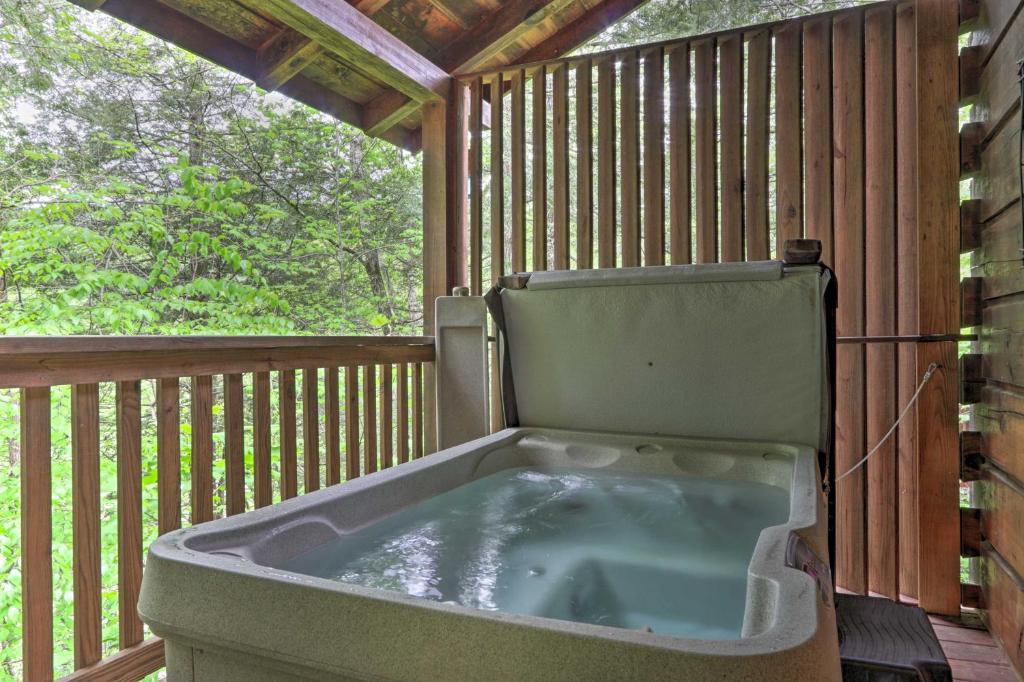 Romantic Gatlinburg Studio Cabin with Hot Tub and Deck - image 5