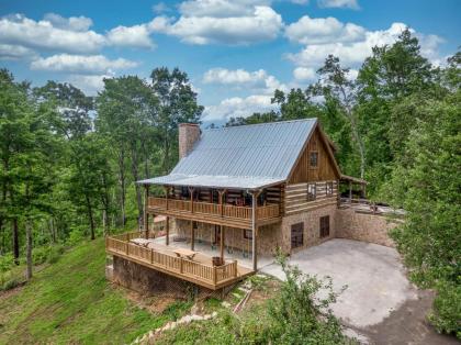 Hand Hewn Hideaway Stunning Gatlinburg Cabin with Hot Tub Table Games and Outdoor Oasis - image 1