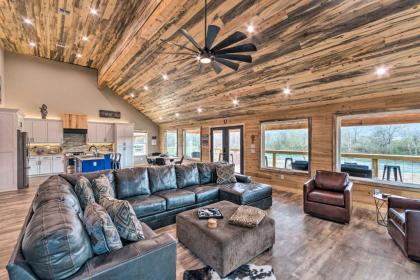 Upscale Riverfront Home with Beach and Fire Pit! - image 10