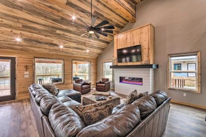 Upscale Riverfront Home with Beach and Fire Pit! - image 9