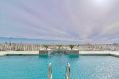 Beachfront Gulf Shores Condo with Patio and Pool Access - image 2