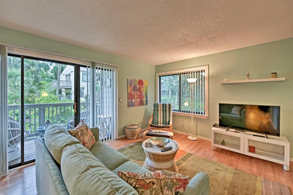 Beach Condo with Pool Access and Porch about half Mi to Shore! - main image