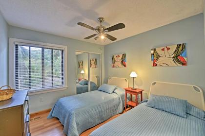 Beach Condo with Pool Access and Porch about half Mi to Shore! - image 11