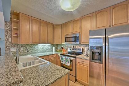 Beach Condo with Pool Access and Porch about half Mi to Shore! - image 18