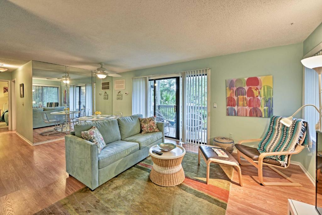 Beach Condo with Pool Access and Porch about half Mi to Shore! - image 5