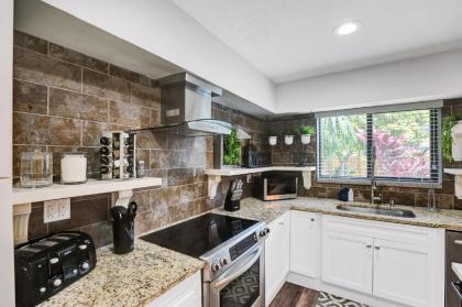 Trendy Renovated 4 BR Home w/ Heated Pool - image 6