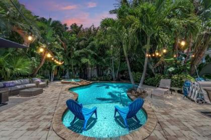 Blocks to the white sand beaches with a backyard oasis that you will never want to leave Florida