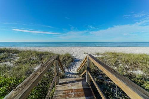 Villa By The Sea is only steps to the white sand beach gear and 6 bikes for your use - main image