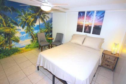 210 TROPICS!! IN PARADISE! BLOCK FROM BEACH!! - image 10