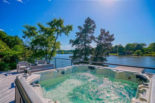 Lakefront Smart Home with Luxe Multi-Level Deck! - image 3