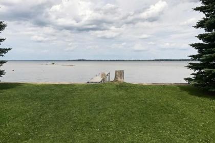 Prudenville Lakefront House with Yard and Private Dock Houghton Lake