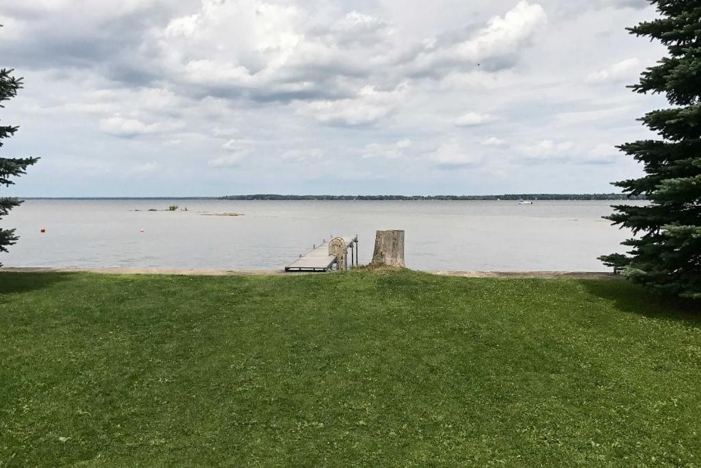 Prudenville Lakefront House with Yard and Private Dock - main image