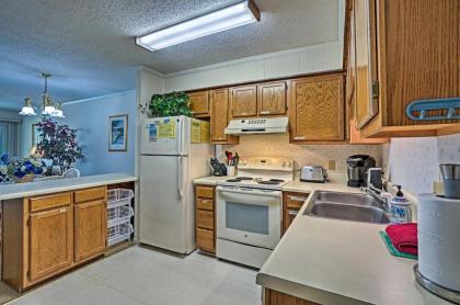 Coastal Condo with Pool Access - Walk To Beach! - image 11