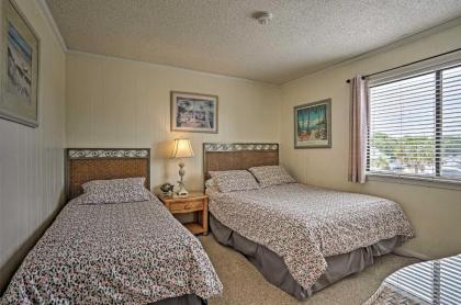 Coastal Condo with Pool Access - Walk To Beach! - image 13