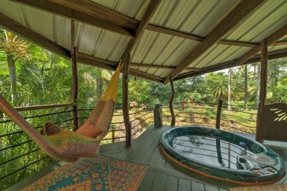 Secluded Keaau House with Hot Tub and Wraparound Porch! - image 5