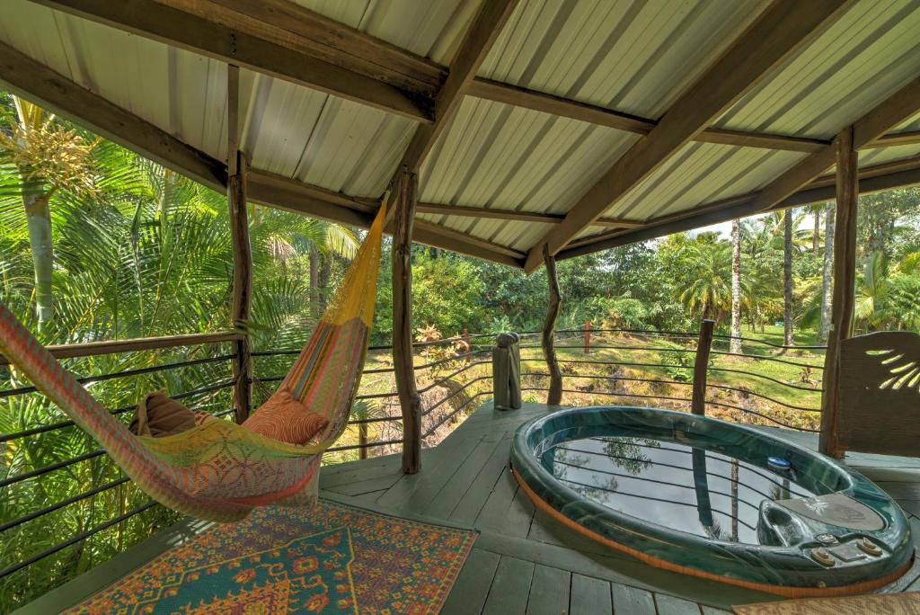 Secluded Keaau House with Hot Tub and Wraparound Porch! - image 5