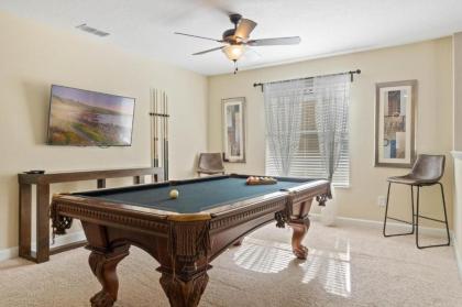 Spacious Vacation Home with Pool & Jacuzzi Near Disney - image 13