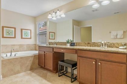 Spacious Vacation Home with Pool & Jacuzzi Near Disney - image 17