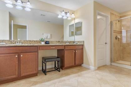 Spacious Vacation Home with Pool & Jacuzzi Near Disney - image 18