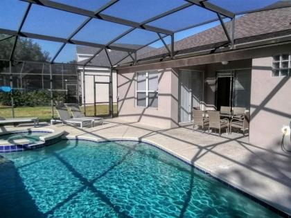 The Magic Escape an Exceptional 4 Bedroom Pool Home with Private Movie Theater and Game Room at the Windsor Palms Resort minutes from Disney World - image 2