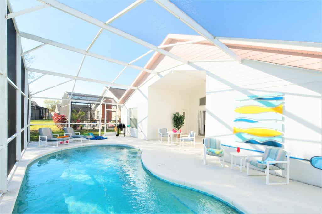 Honey Pot Villa- 4 bedrooms with a private pool- Close to Disney! - image 3