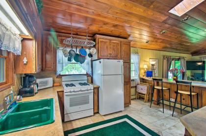 Cozy Lakefront Lapeer House with 2 Paddle Boats! - image 3