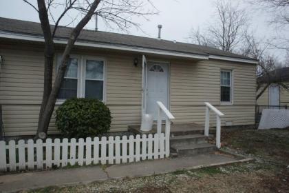 1 bedroom with a fireplace close to base - image 1