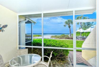 LaPlaya 101A Step out to the beach from your screened lanai Light and bright end unit - image 3