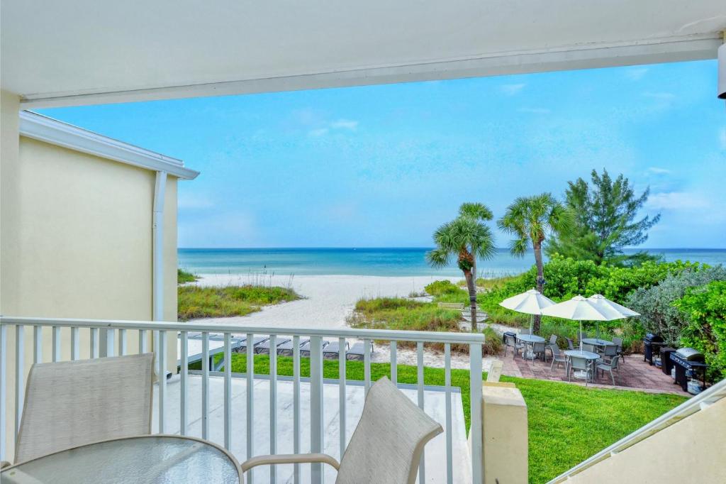 LaPlaya 201C Breathtaking Gulf panorama from this corner end unit with a private stairway to the beach - image 6