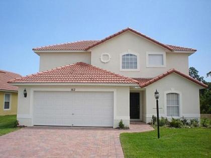 this wonderful 4 bedroom house Located on the Lake Wilson Preserve Loughman Florida