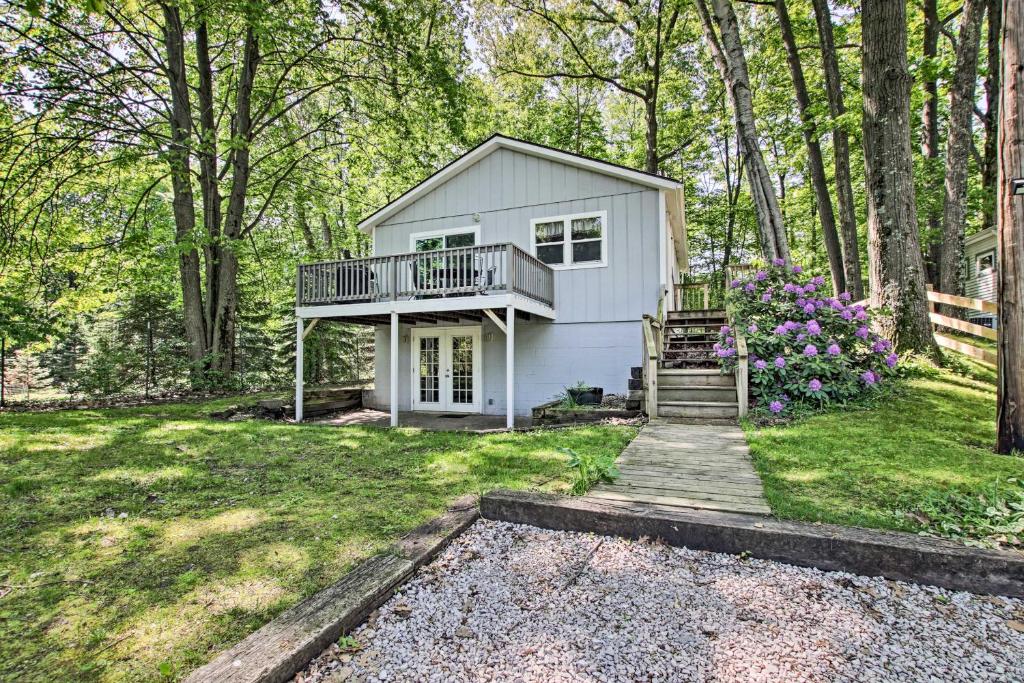 Ludington Cottage with Deck Yard and Fire Pit! - main image