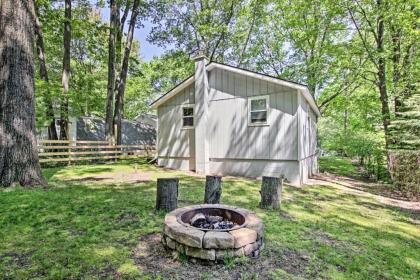 Ludington Cottage with Deck Yard and Fire Pit! - image 8