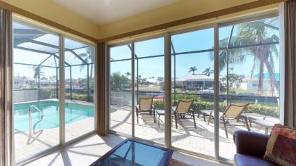 Waterfront 3 Bed Plus Den 3 Bath HomeHeated Pool w/ Large Screened-In Lanai! - image 8