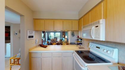 Pristine 2 Bed Condo Steps from Free Beach Access - image 11