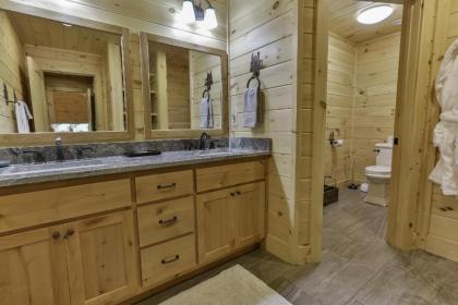 TAKE IT EASY in this Custom designed luxury log cabin is located in quiet area on paved road. - image 10