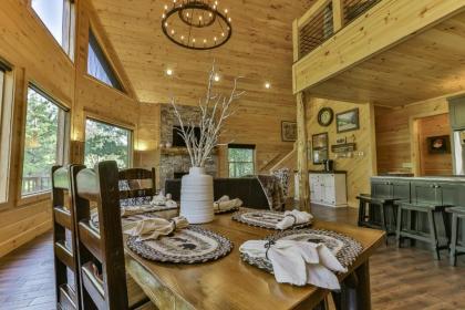 TAKE IT EASY in this Custom designed luxury log cabin is located in quiet area on paved road. - image 13