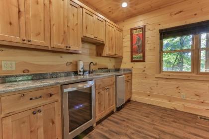 TAKE IT EASY in this Custom designed luxury log cabin is located in quiet area on paved road. - image 7