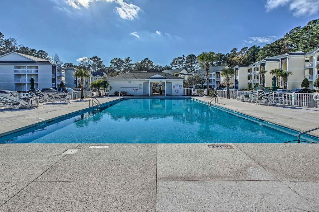 Coastal Resort Condo - Swim Golf and Relax! - main image