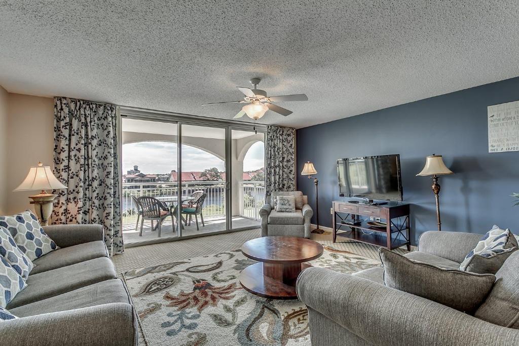 Yacht Club Villas 3 303 - Upscale waterway view condo with an onsite golf course - main image