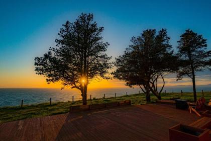 Chic Oceanfront Retreat with Deck and Mountain Views! - image 14