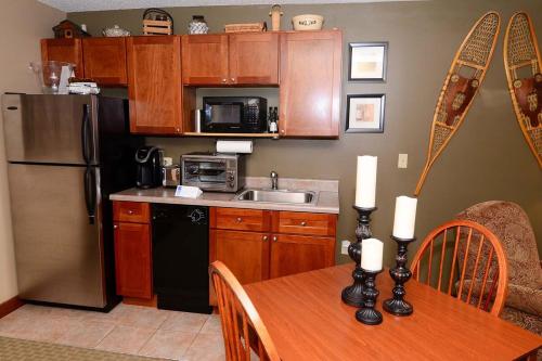 A208- One bedroom suite standard view with a cozy fireplace! - image 2