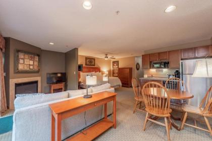 A125 - Studio Suite with Lake View End Unit with Private Balcony Cozy Fireplace! - image 1