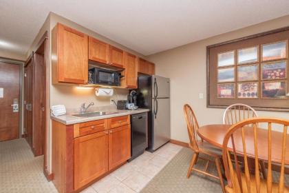 A125 - Studio Suite with Lake View End Unit with Private Balcony Cozy Fireplace! - image 17