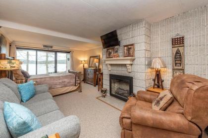 106A - Recently Renovated Lakefront Efficiency Condo with Fireplace! - image 1