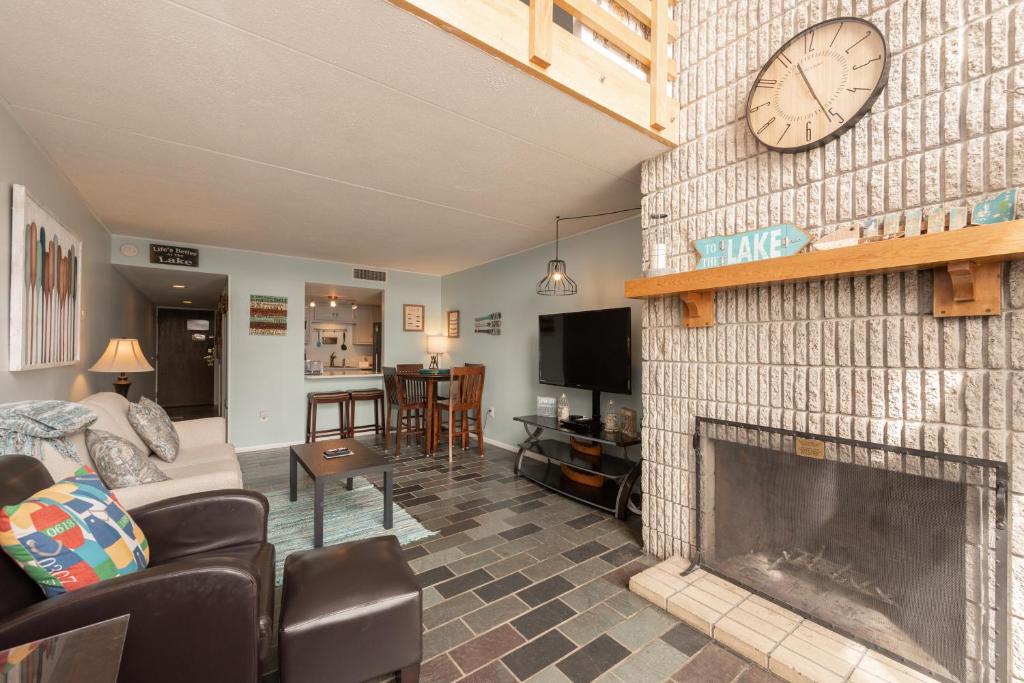 306C - Unique Lakefront One Bedroom Condo with Great Fireplace & Scenic Balcony! - image 5