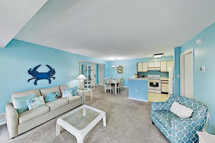 Oceanside Gem with Private Deck Canal Views  Pools condo Ocean City