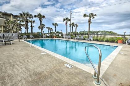 Coastal Condo with Patio Swim Golf and Explore! - image 3